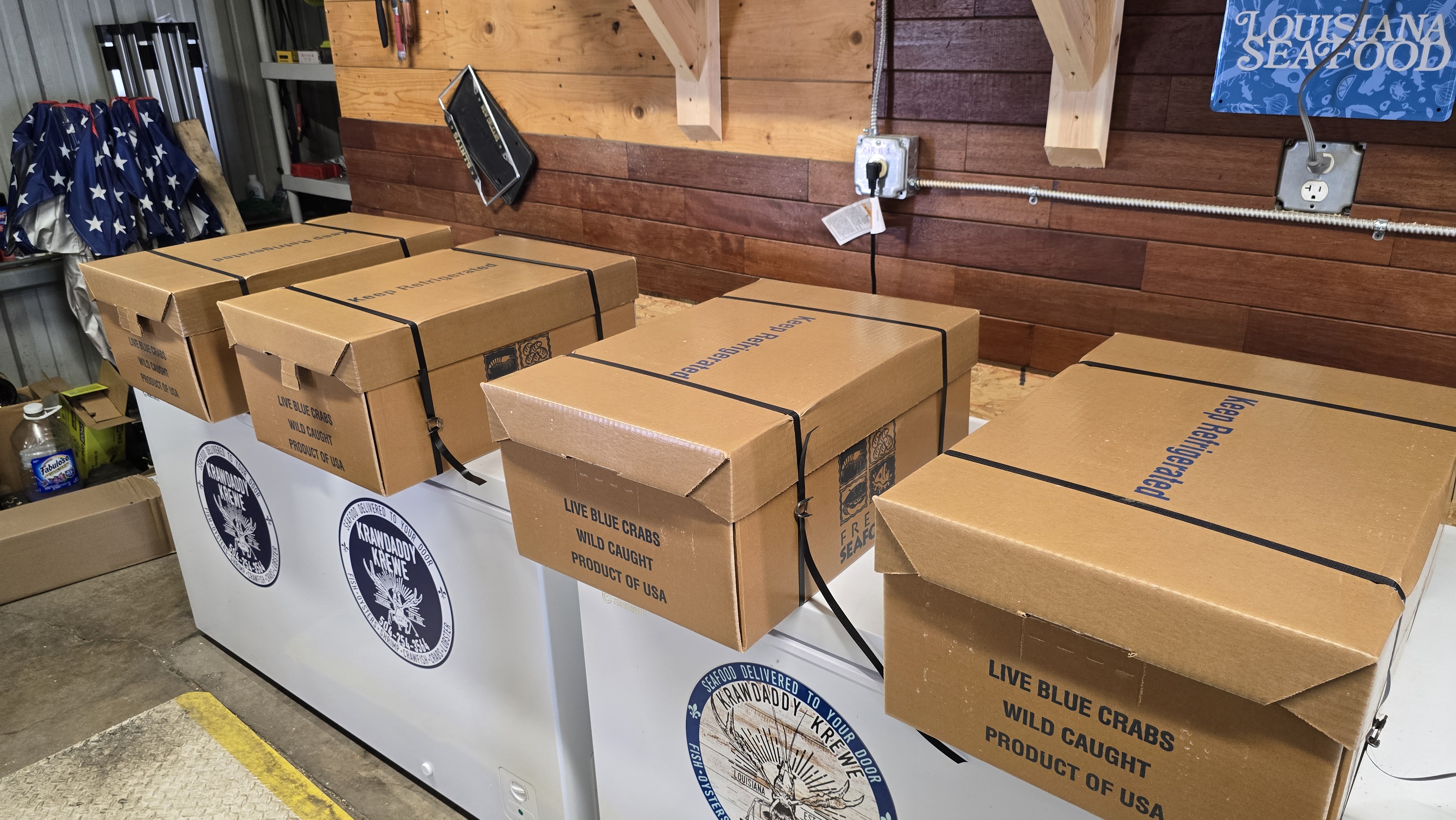 Seafood boxes staged and strapped for transport